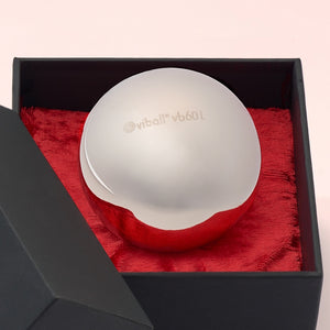 Close-up of a Viball VB60 Light 60 mm large medical Kegel ball made of anti-allergenic stainless steel for women and men in a black box on red velvet.